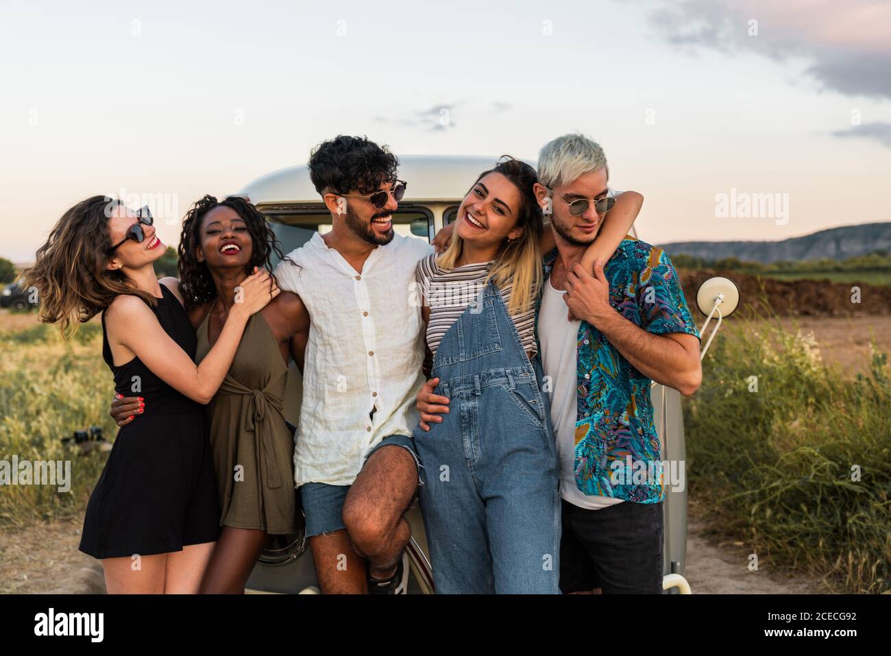 friends hugging in nature Stock Photo