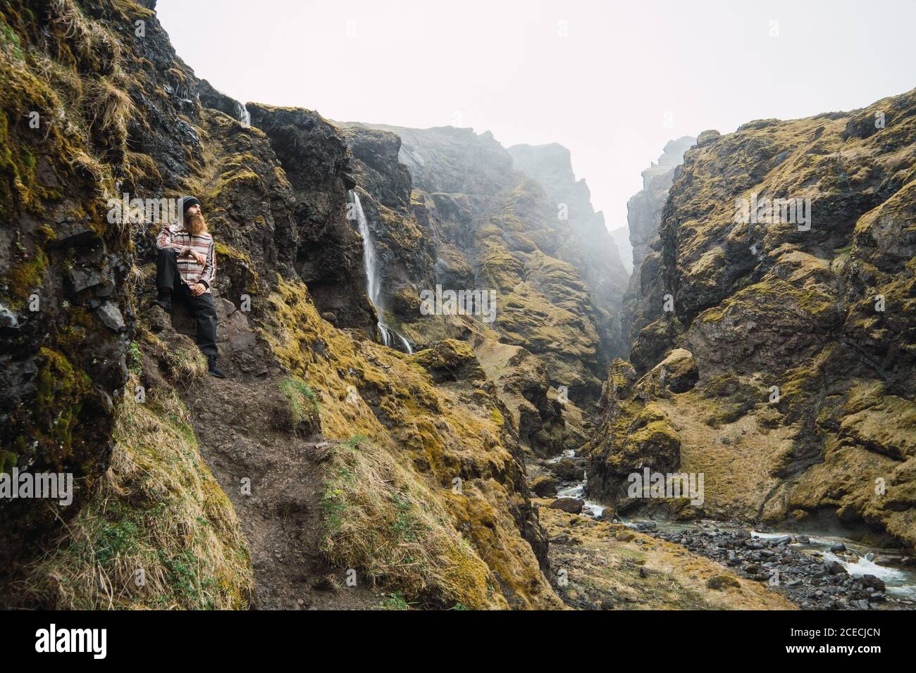man standing in beautiful mountains Stock Photo