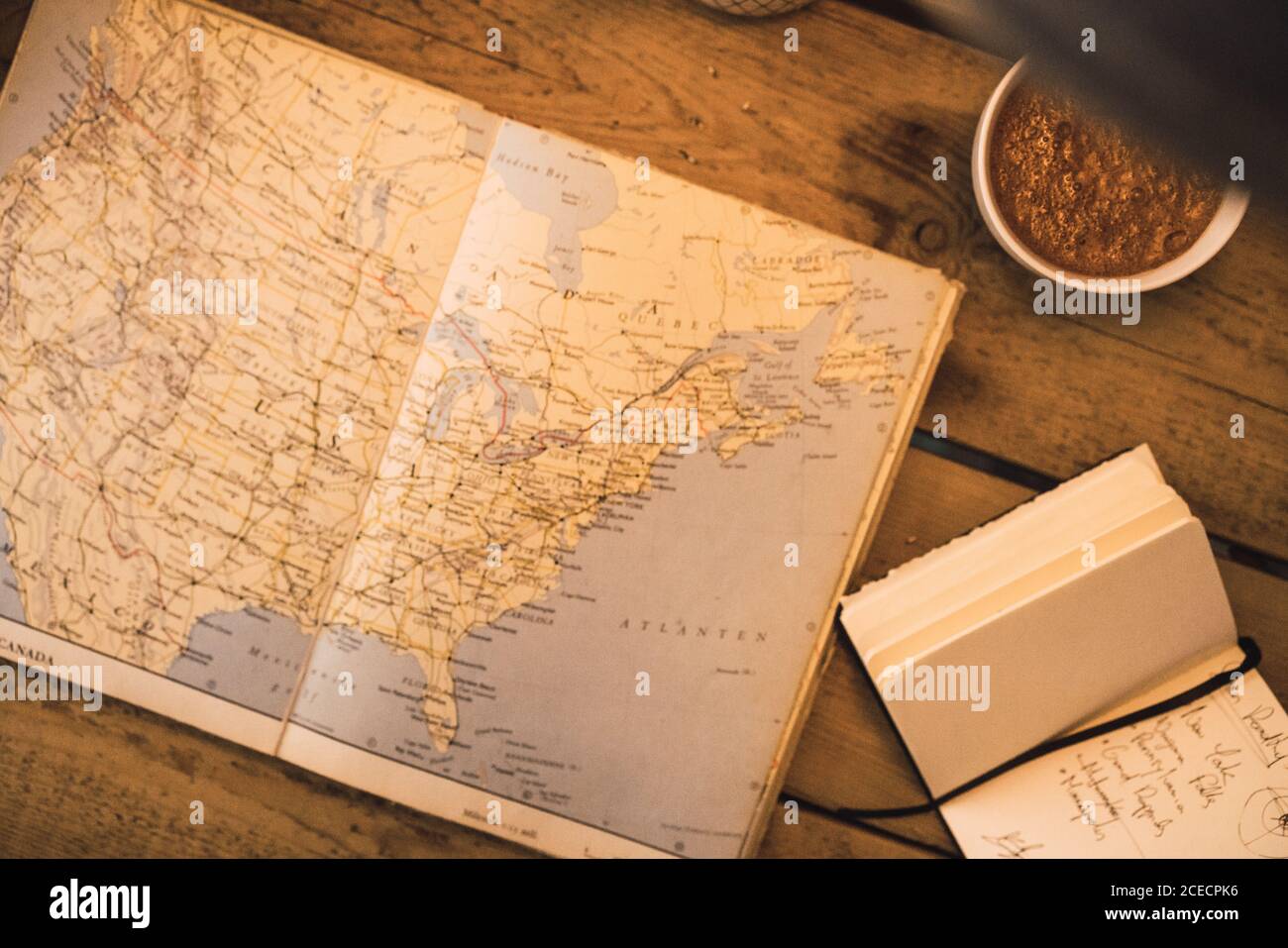 Cacao on table with books Stock Photo
