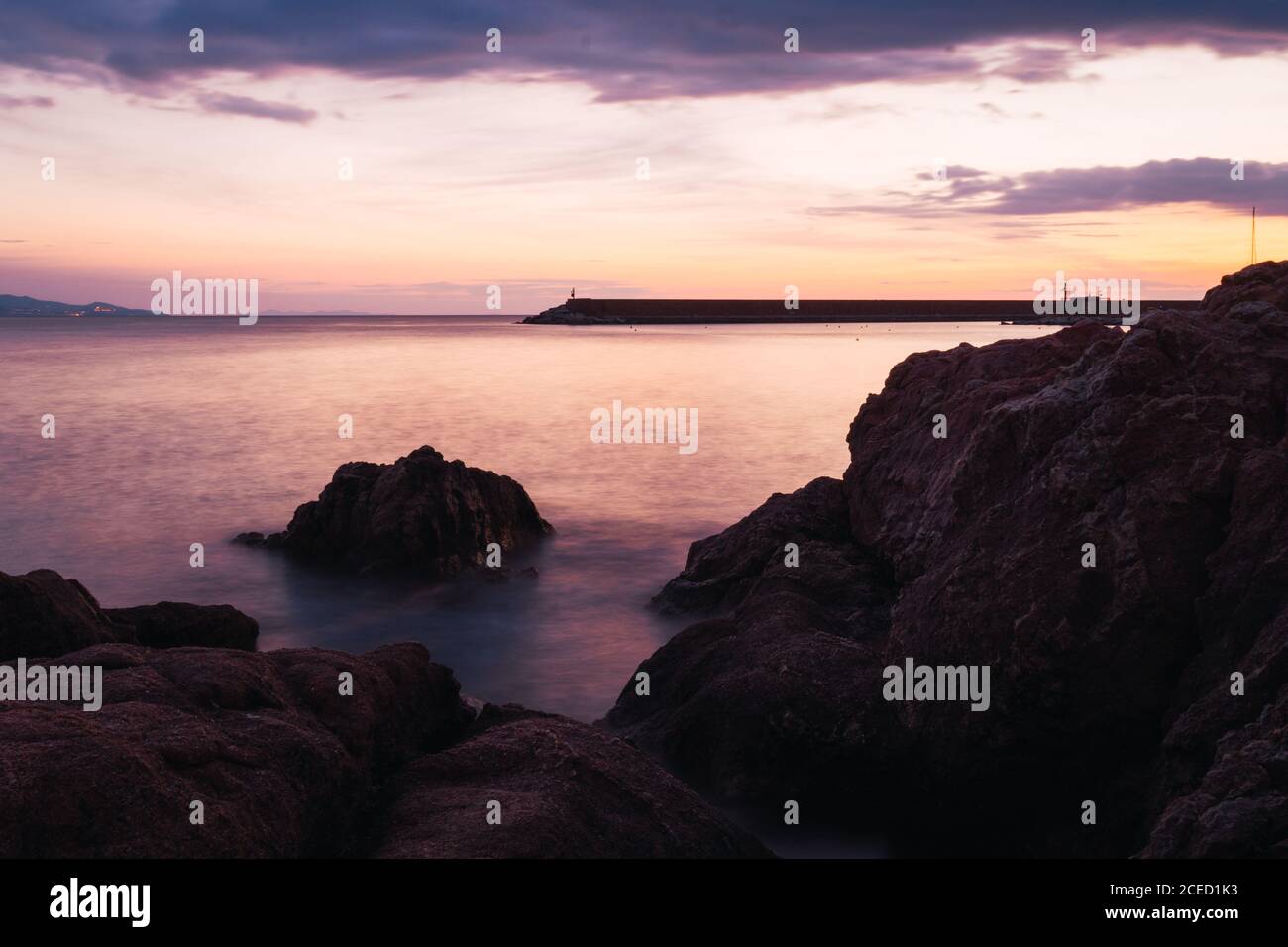 Sunset in cloudy sky Stock Photo