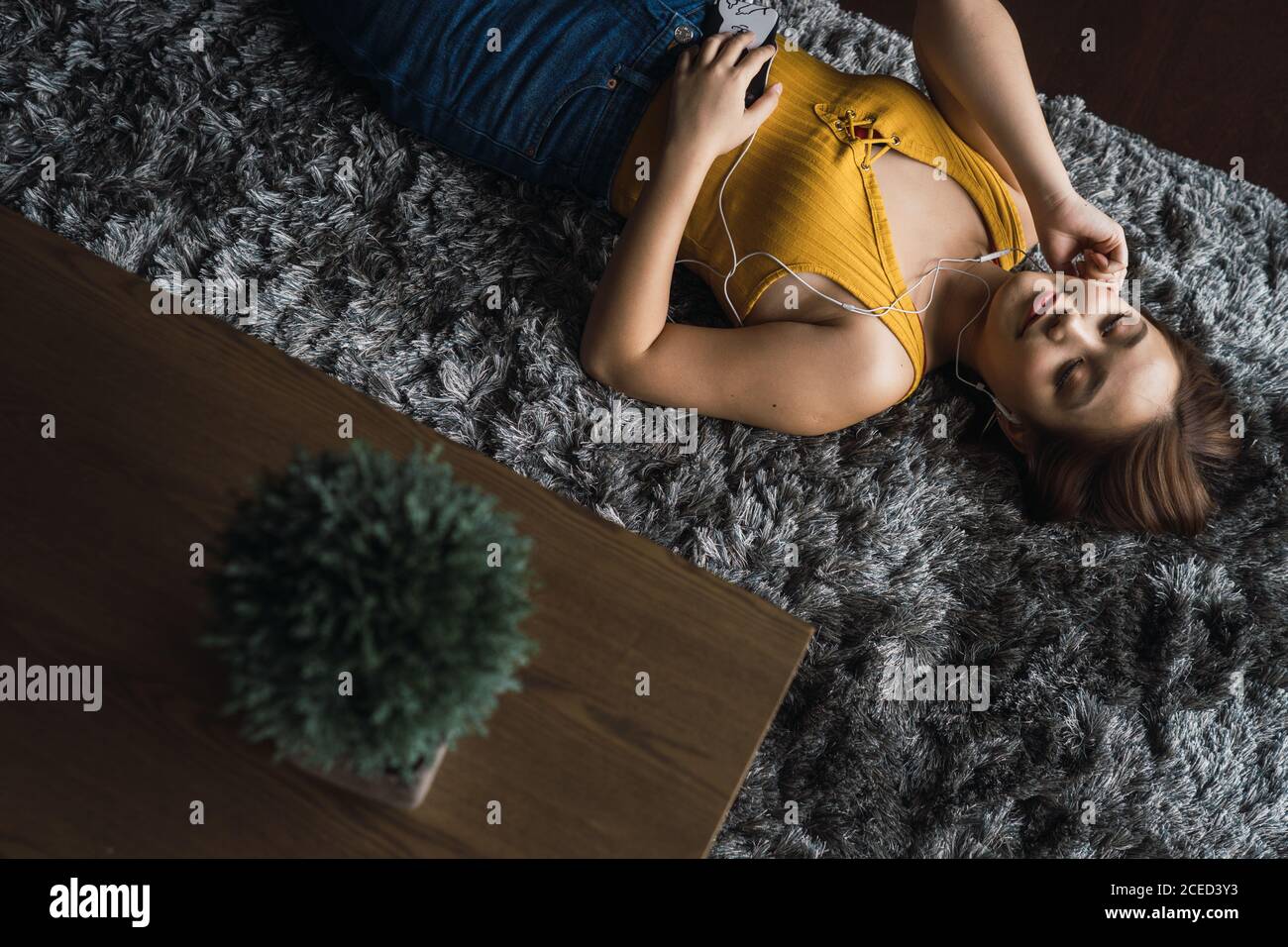 Person lying on floor hi-res stock photography and images - Alamy