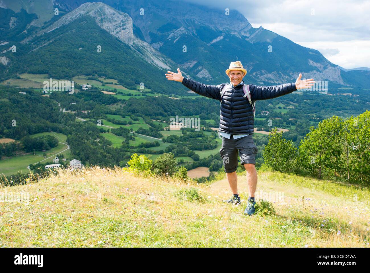 Adult man hiking in the French Alps Stock Photo