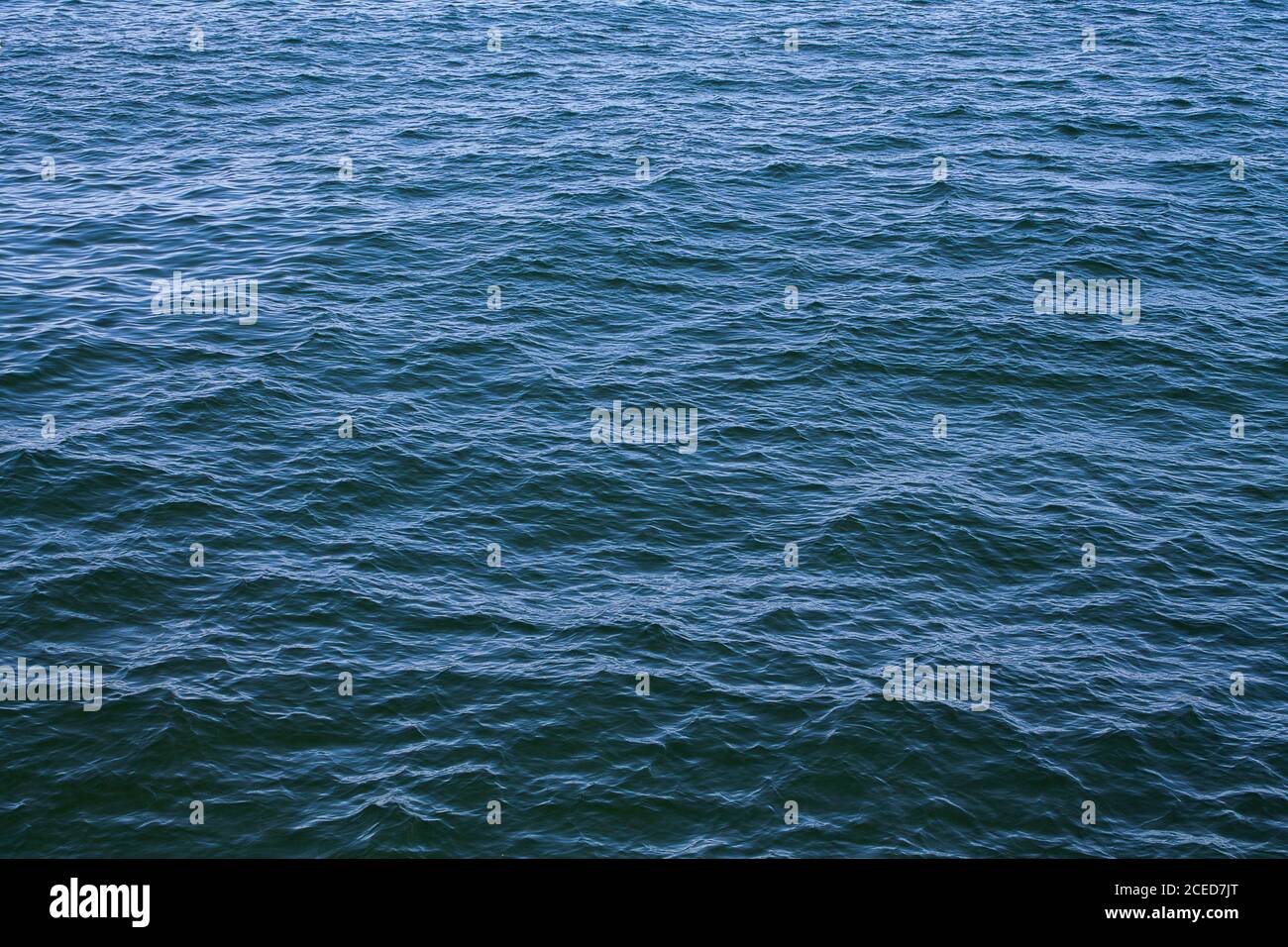 Texture sea water with almost no waves. Stock Photo
