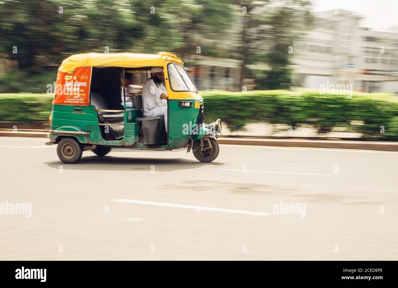 New Delhi, India - AUGUST 13: Moto-Rickshaw in motion, New Delhi, India on AUGUST 13, 2016 in New Delhi, India. Stock Photo