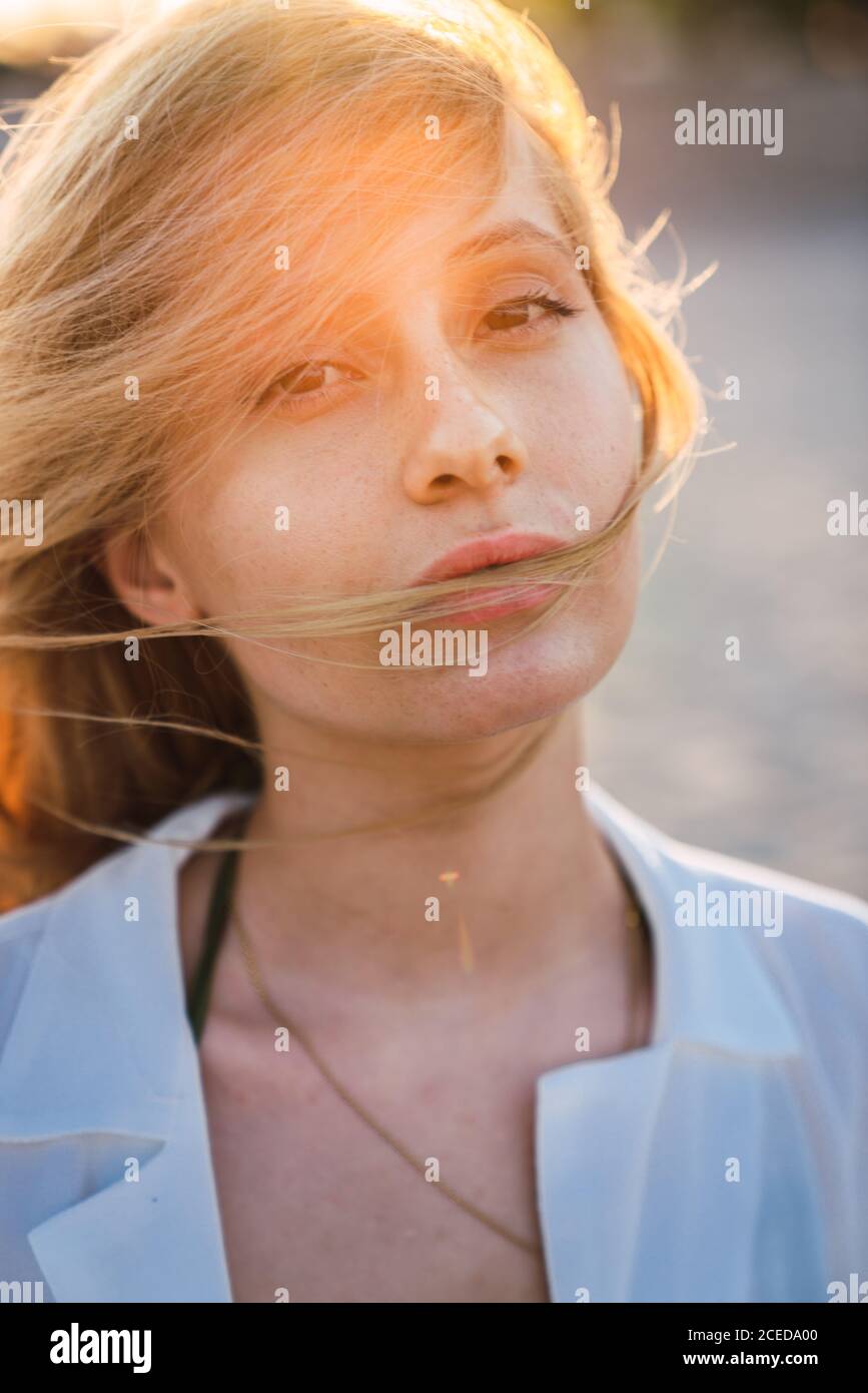 Gorgeous female standing on beach Stock Photo