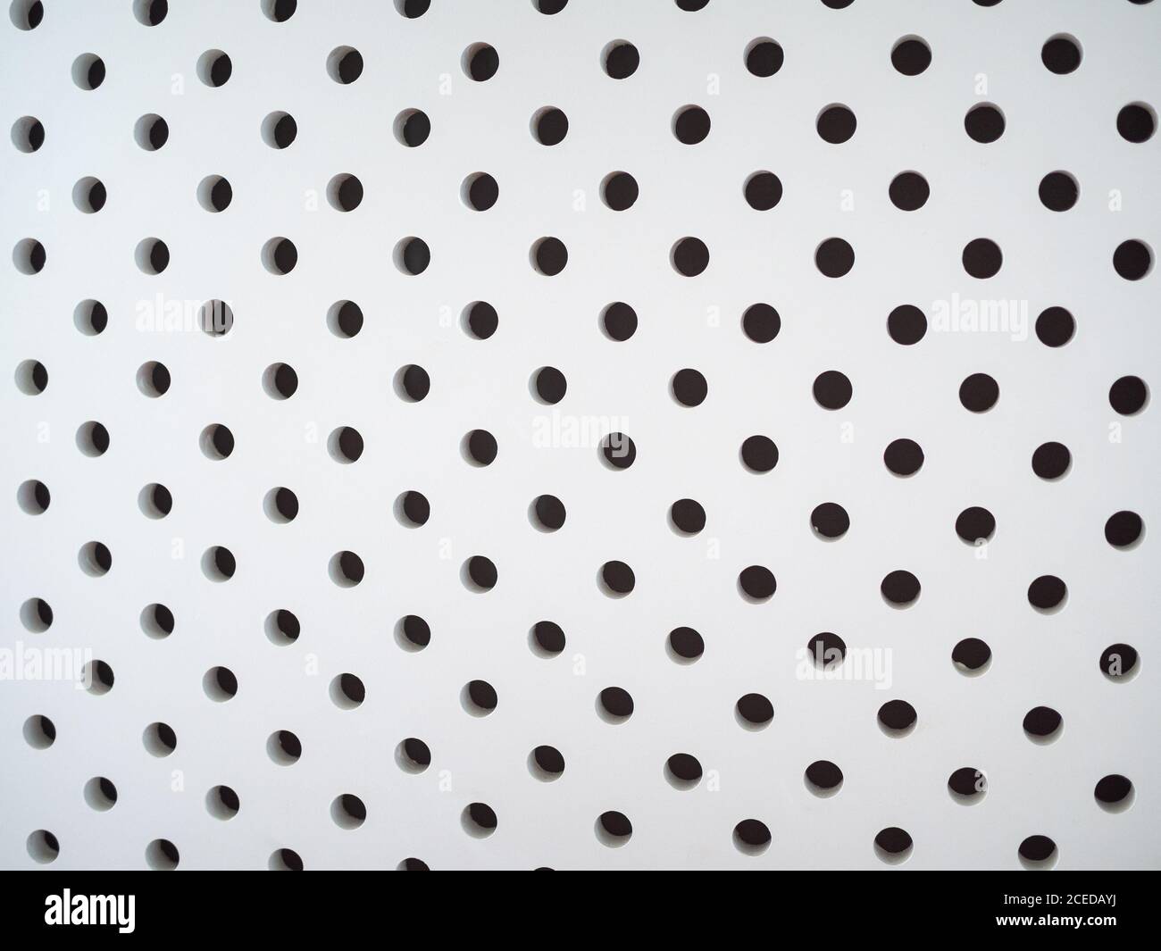 Black holes on a white background texture Stock Photo