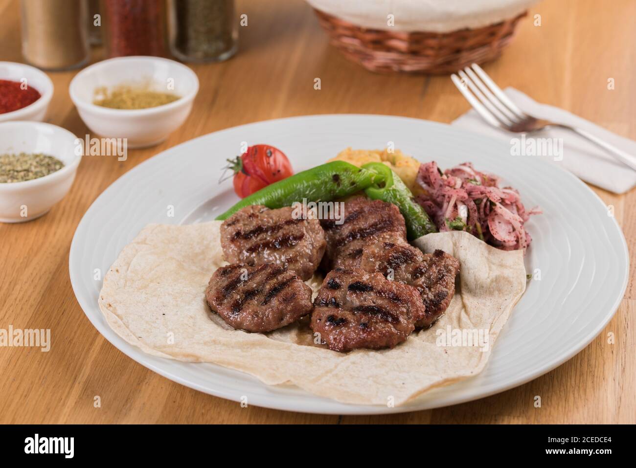 Turkish meatball traditional kofte. Spicy meatballs Kebab or Kebap. Stock Photo