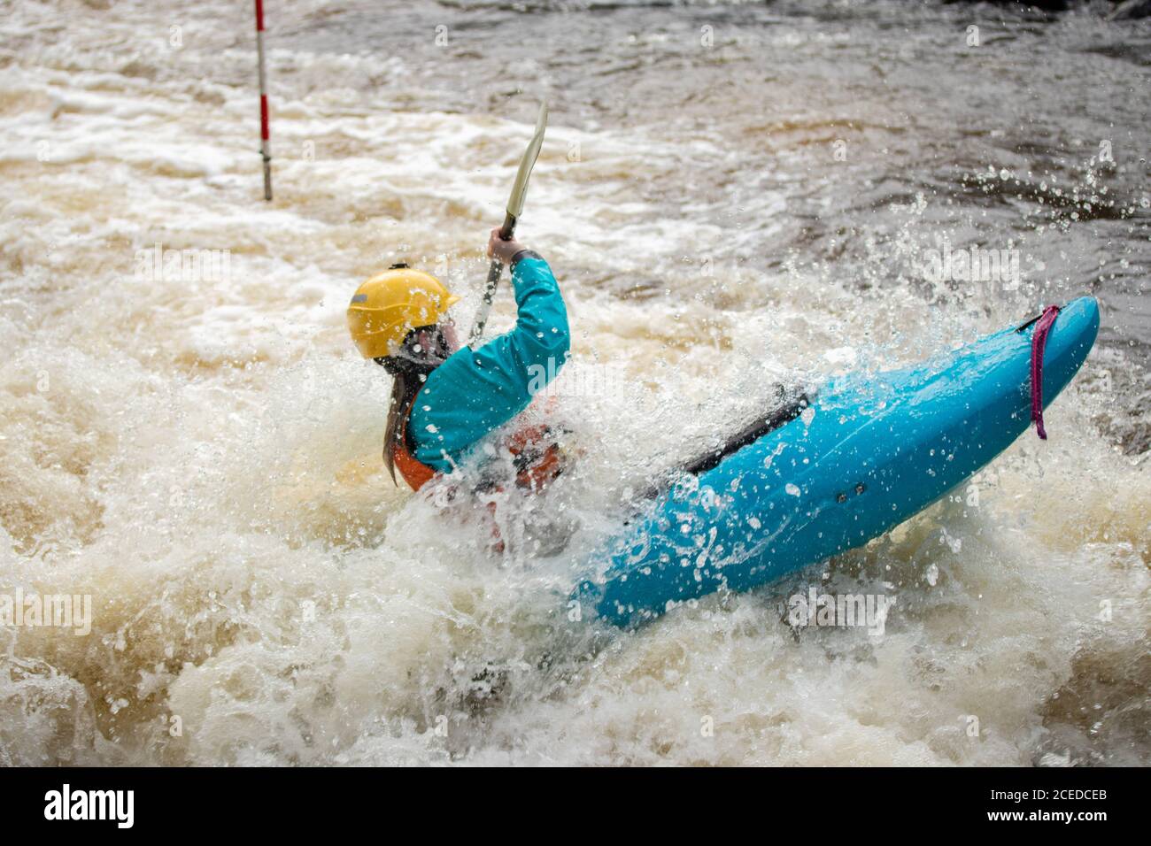 Girl, women in kayak sails mountain river. Whitewater kayaking, extreme  sport rafting. Ireland. Europe Stock Photo - Alamy