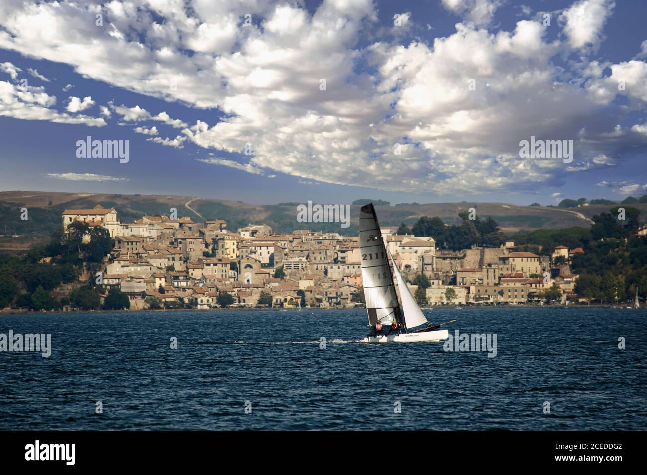 Sailing exercises at Bracciano lake in front of Anguillara Sabazia, Italy, august 2016 Stock Photo