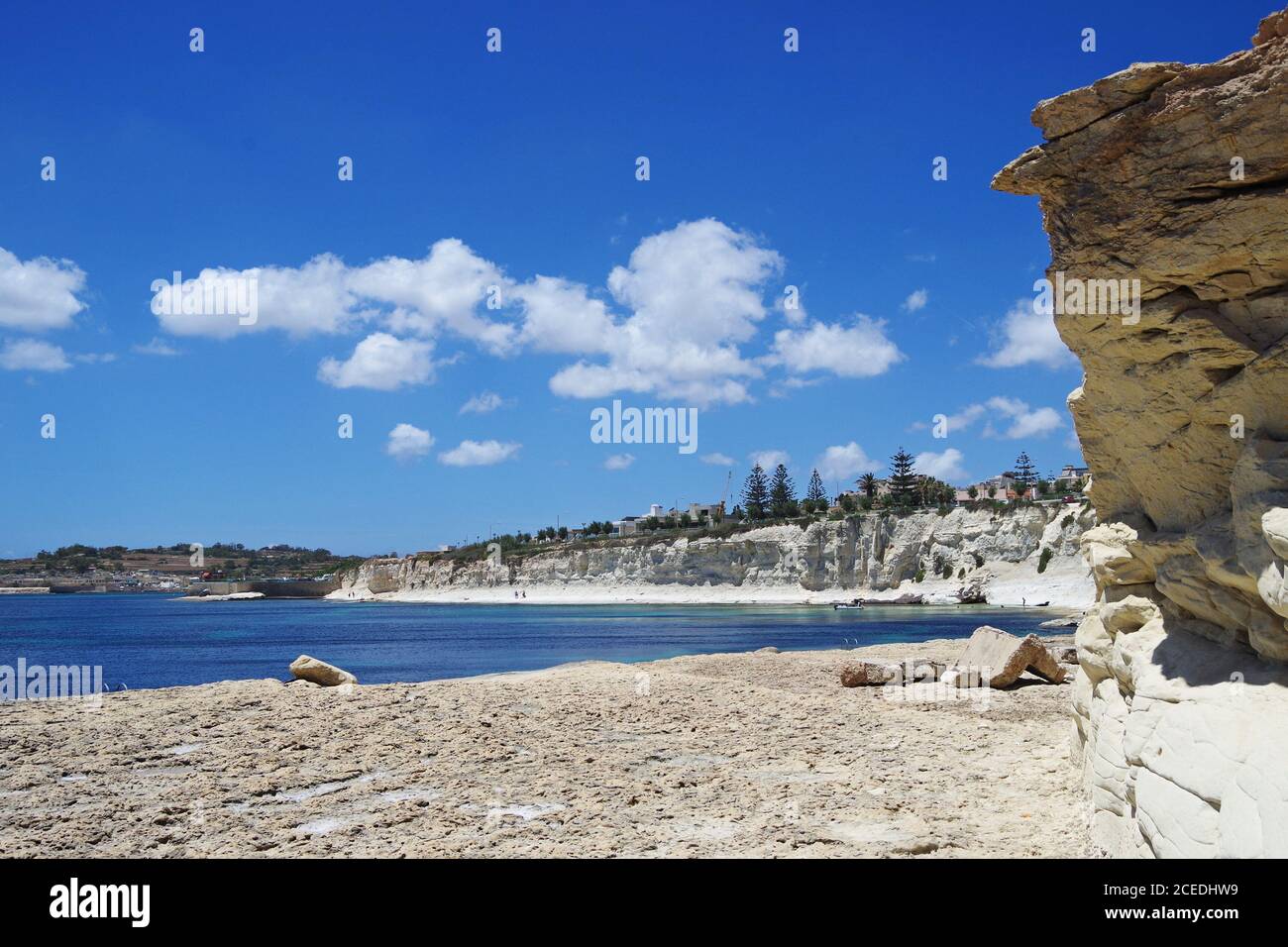 Beach and rocks, St Thomas bay, Malta Stock Photo Alamy