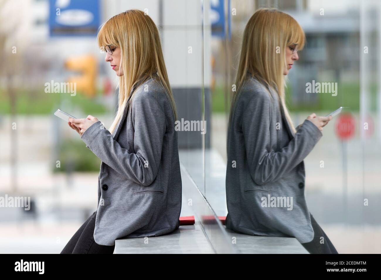 Young beautiful Woman talking on phone Stock Photo