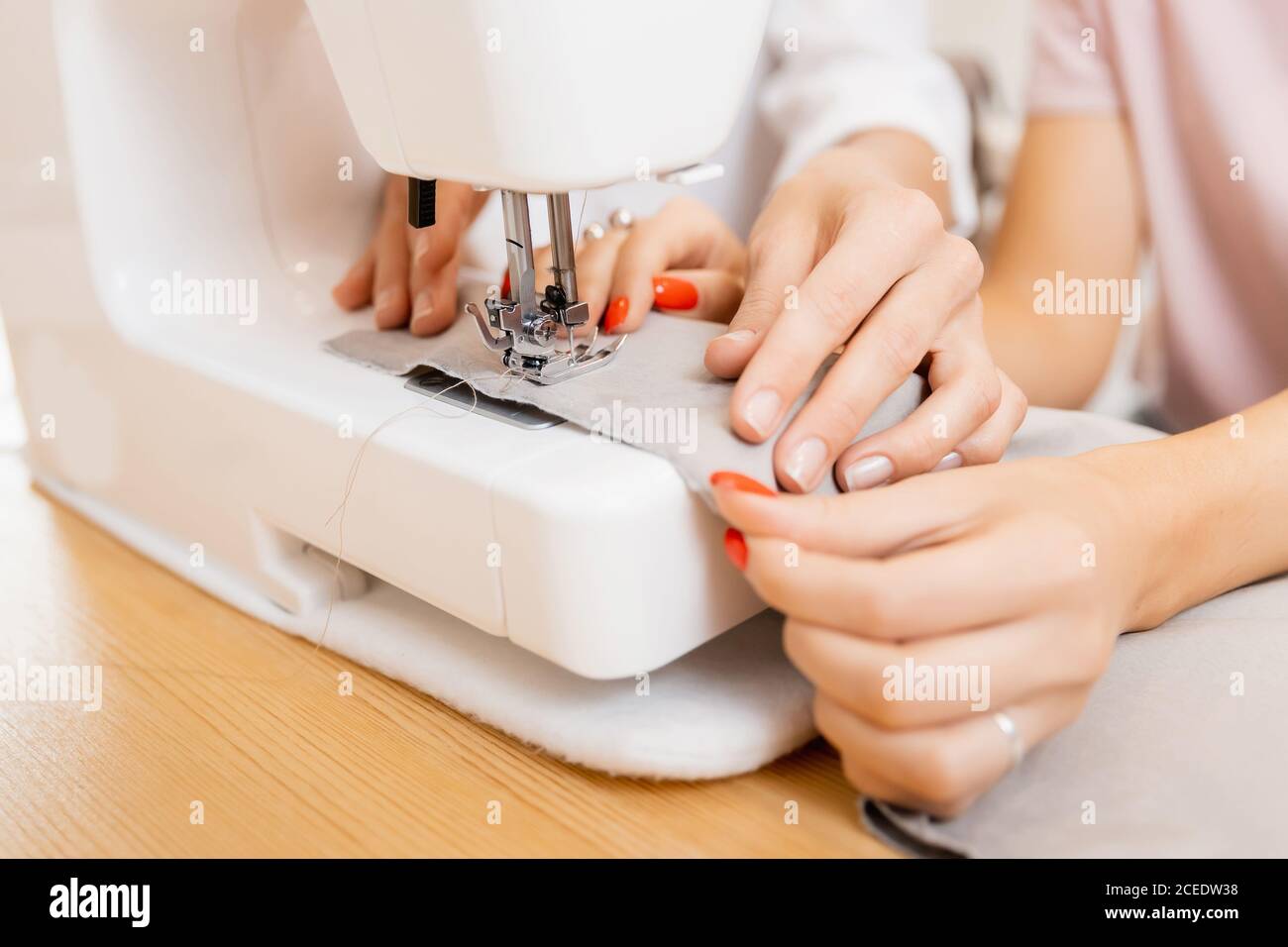 Tailor dressmaker at work Stock Photo - Alamy