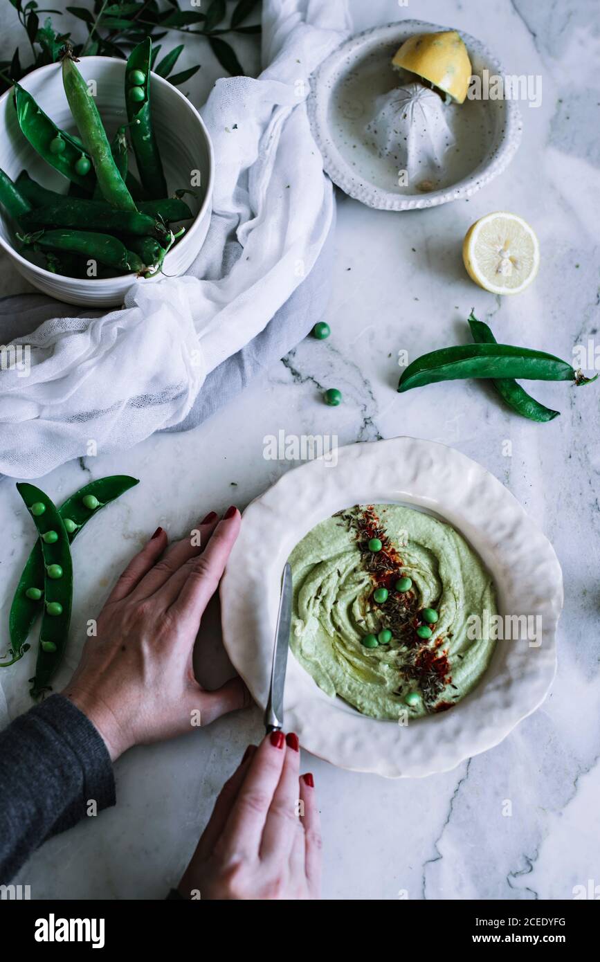 Bowl with tasty mashed peas Stock Photo