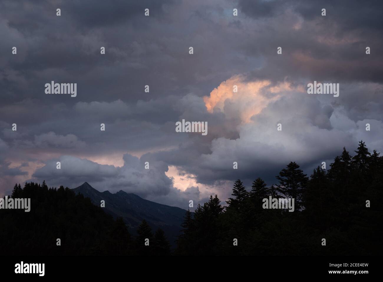Sunset skyscape over the Swiss mountains Stock Photo