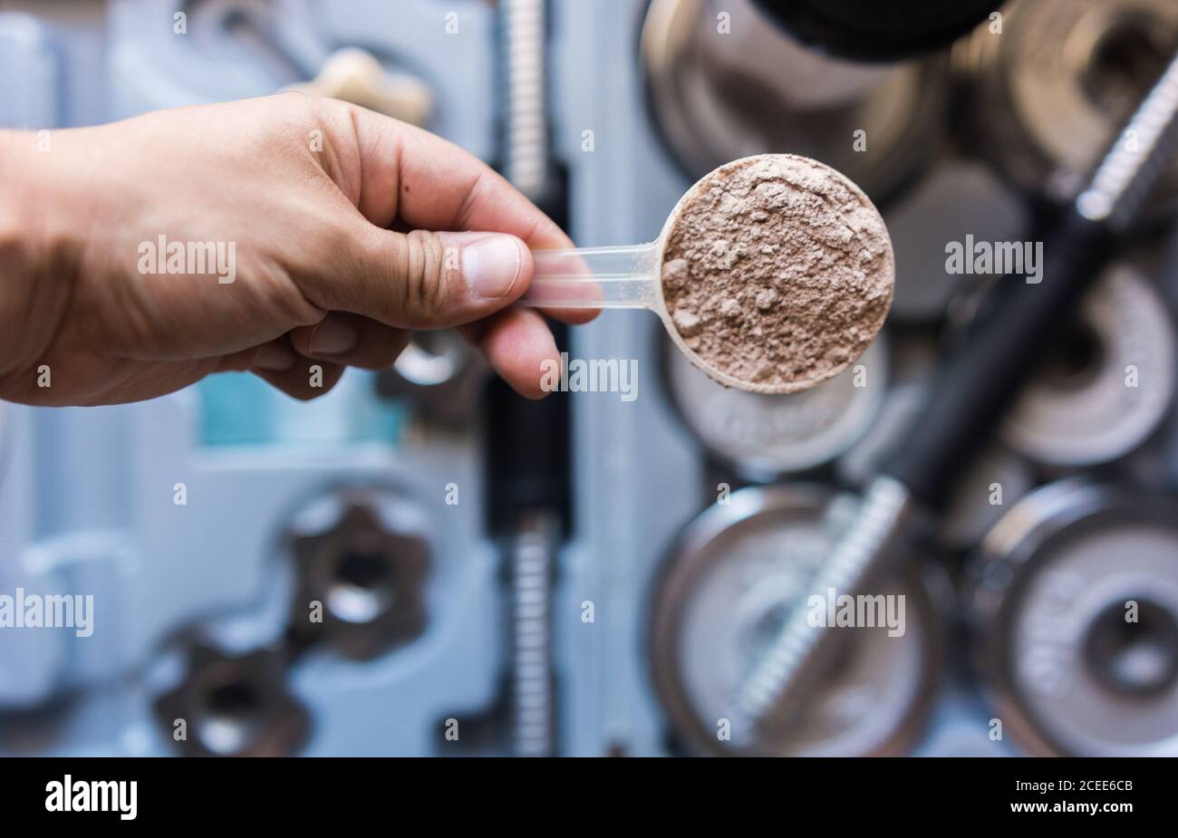 Whey protein shake with chocolate flavor. Basic food for fitness athletes Stock Photo