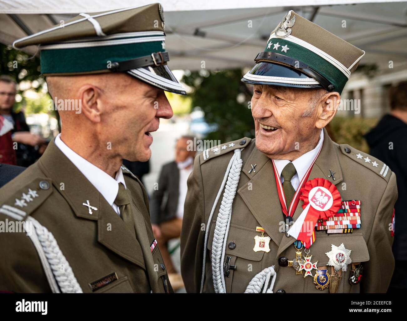 Berlin, Germany. 01st Sep, 2020. Jozef Kolesnicki (r), soldier of the Polish Army in the Red Army and participant in the Battle of Berlin 1945, welcomes a former Polish soldier at the inauguration of the 'Memorial to the Polish Liberators of Berlin'. The monument in front of the TU Berlin was inaugurated on the occasion of the 81st anniversary of the German invasion of Poland and the beginning of the Second World War on September 1, 1939. Credit: Fabian Sommer/dpa/Alamy Live News Stock Photo