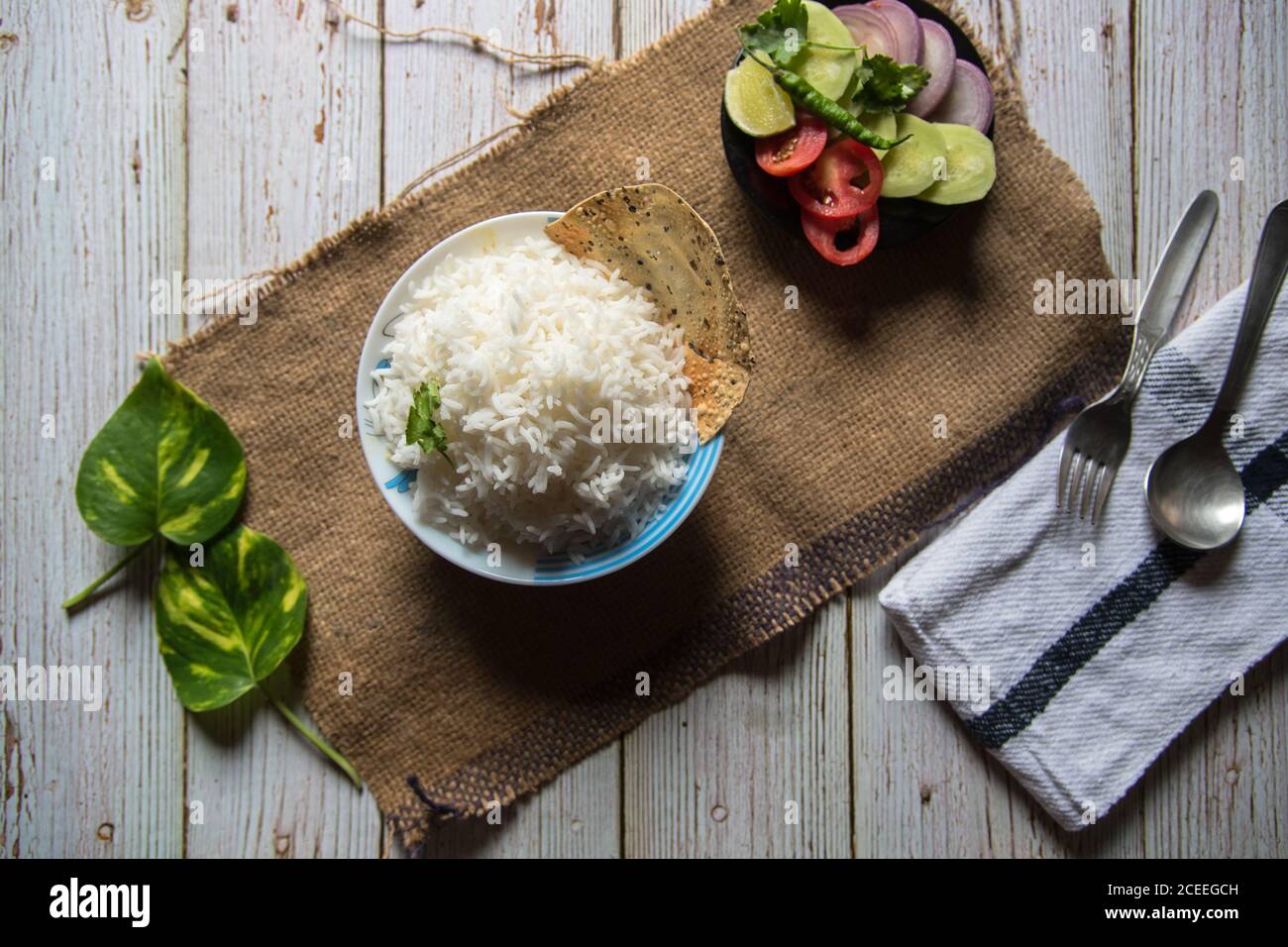 Top view rice with vegetables on a background. A popular and staple food. Stock Photo