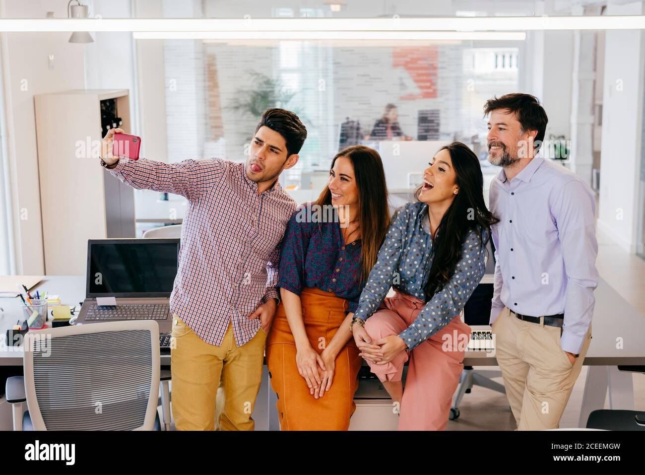 Office employees taking selfie Stock Photo
