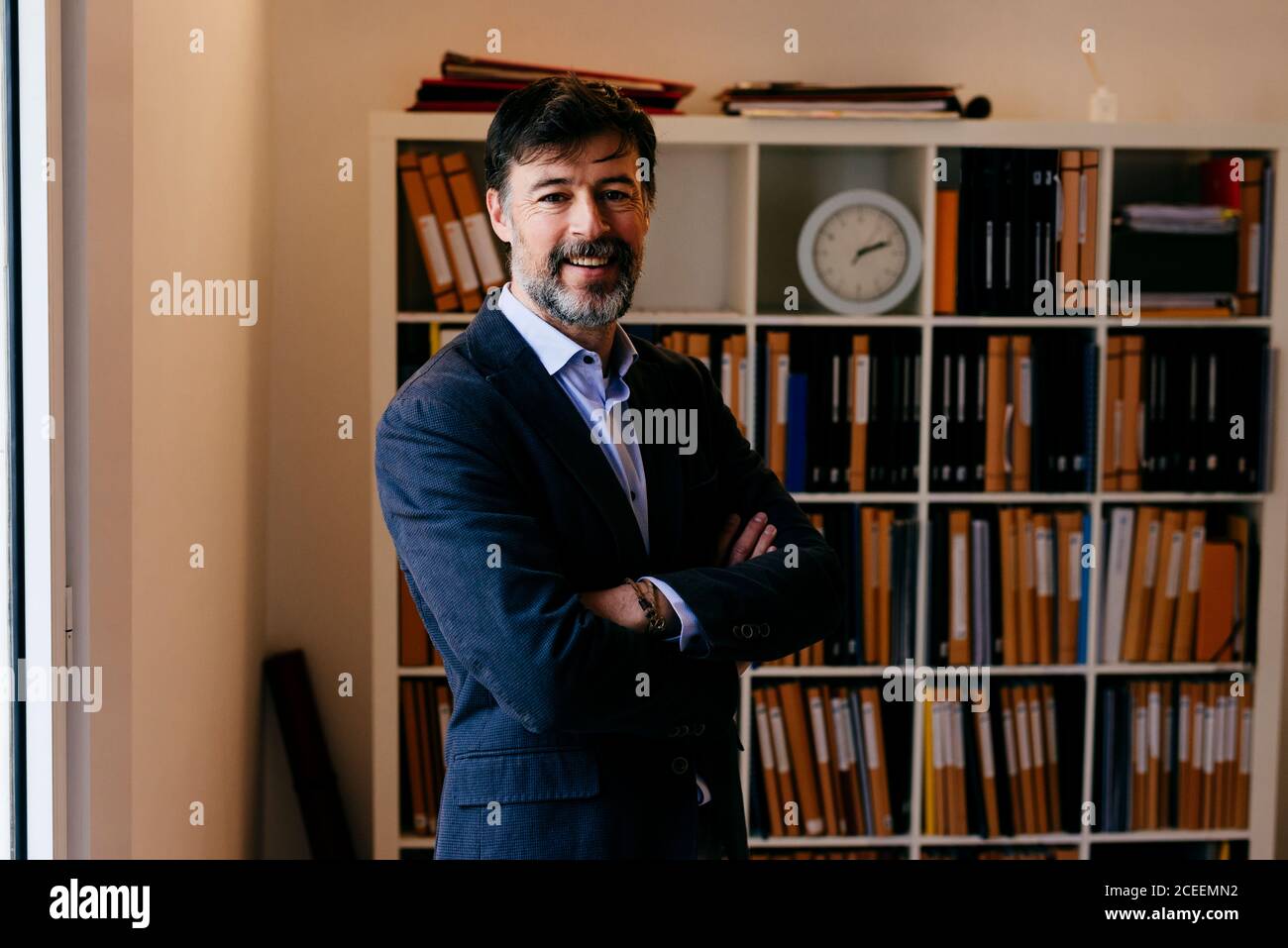 Adult man posing in office Stock Photo