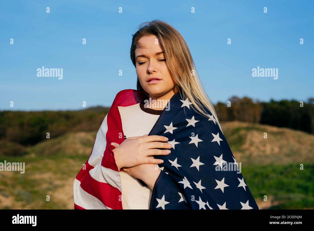 Blonde Woman in flag Stock Photo Alamy