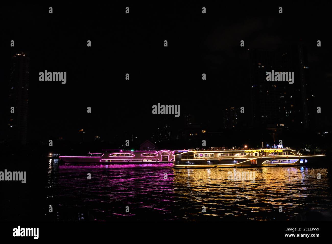 2 colored cruise going the opposite direction Stock Photo