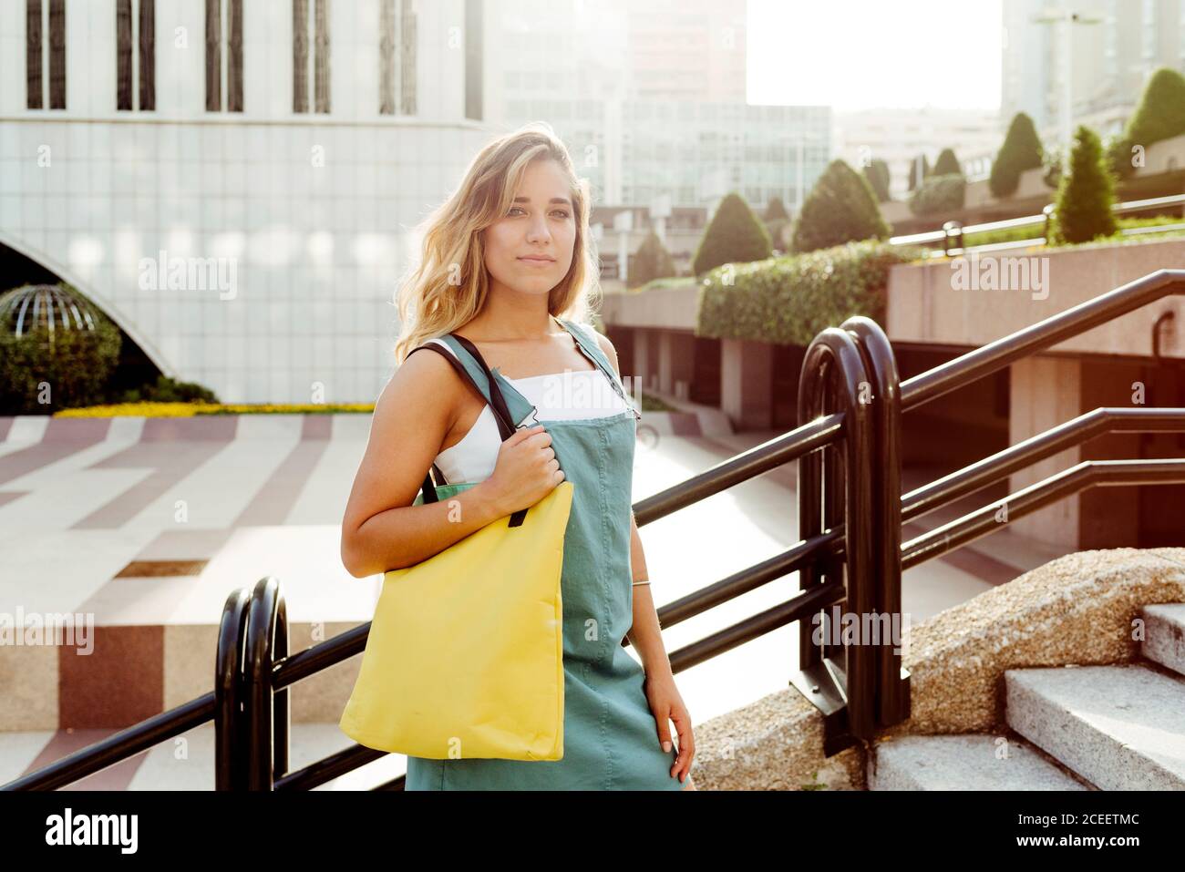 Stylish woman standing outdoors hi-res stock photography and images - Alamy