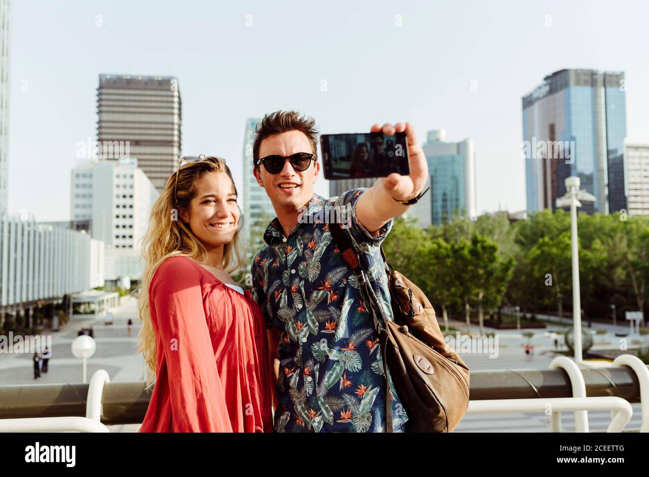 Couple taking selfie at handrail Stock Photo