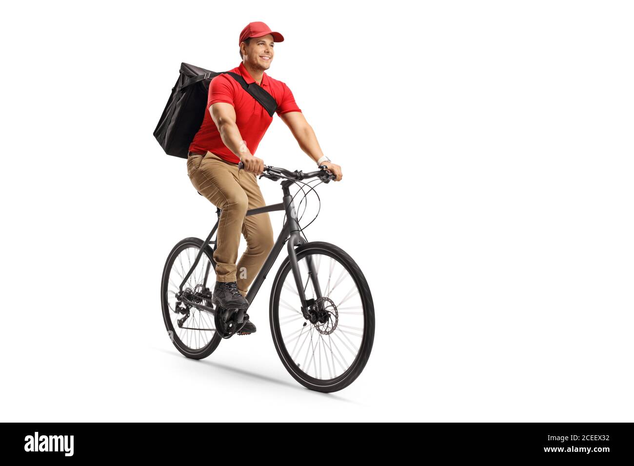 Food delivery guy riding a bicycle isolated on white background Stock Photo