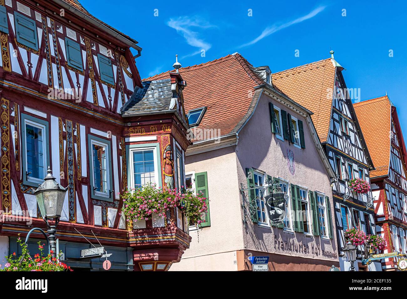 Picturesque half-timbered historic houses in Seligenstadt on the banks of the Main, Germany. The town was of great importance in Carolingian times. Stock Photo