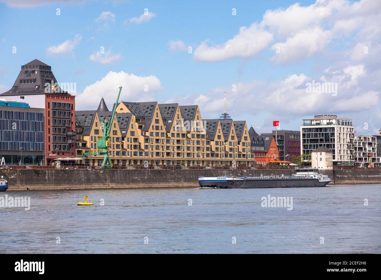 the Rheinau harbour with the office building Silo 23, an old granary and to the old storehouse, now an exclusive residential building, Cologne, German Stock Photo