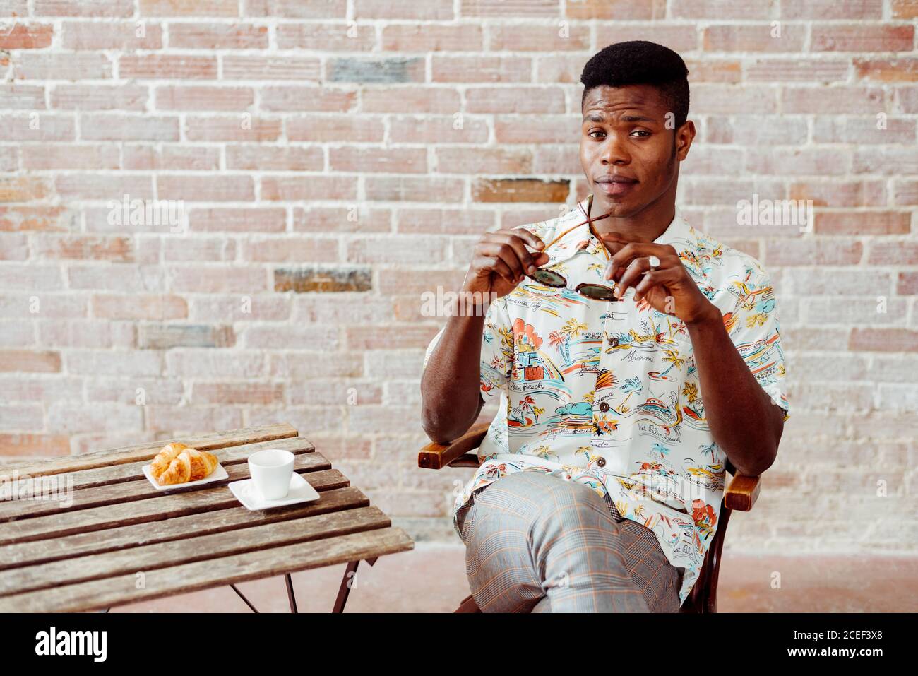 Black man having breakfast Stock Photo