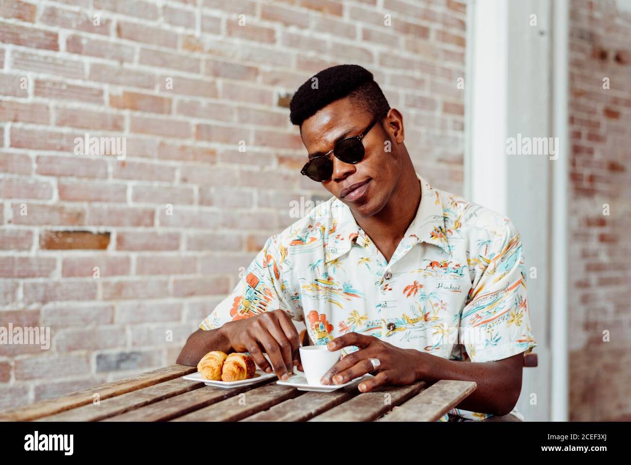 Black man having breakfast Stock Photo
