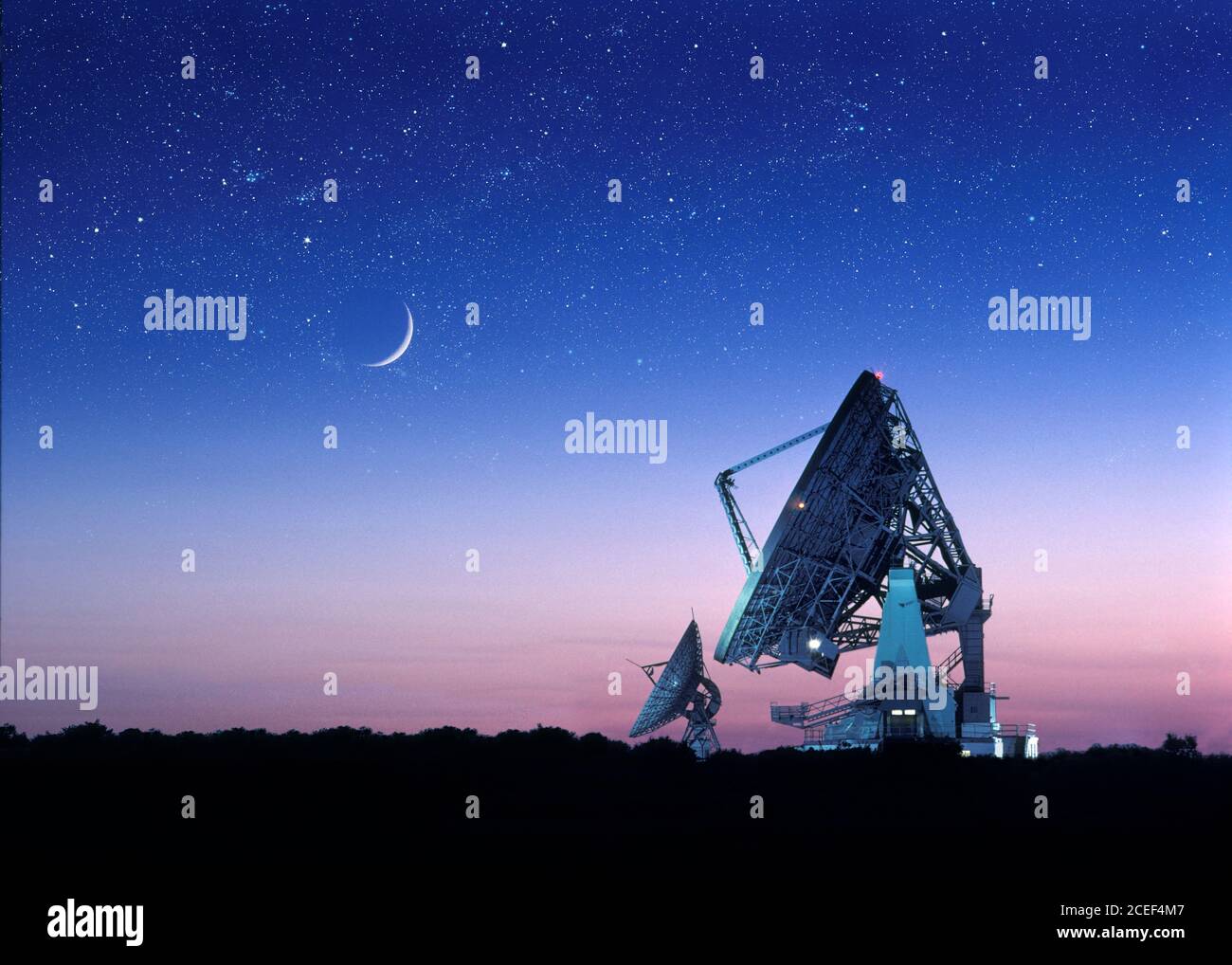 Goonhilly Satellite Earth Station telecommunication dishes crescent moon and stars at night Stock Photo