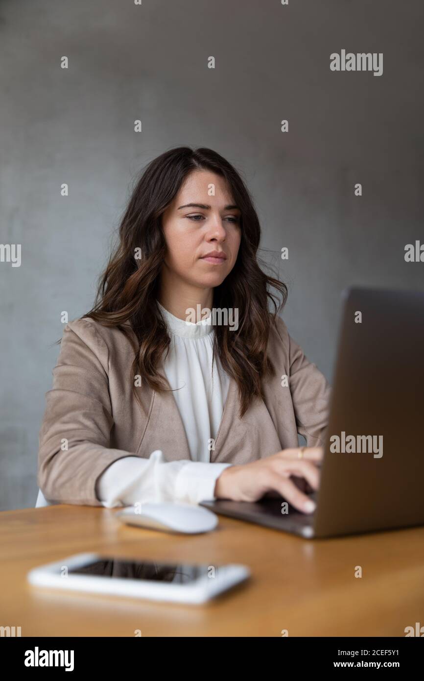 Young girl working with her laptop at home Stock Photo - Alamy