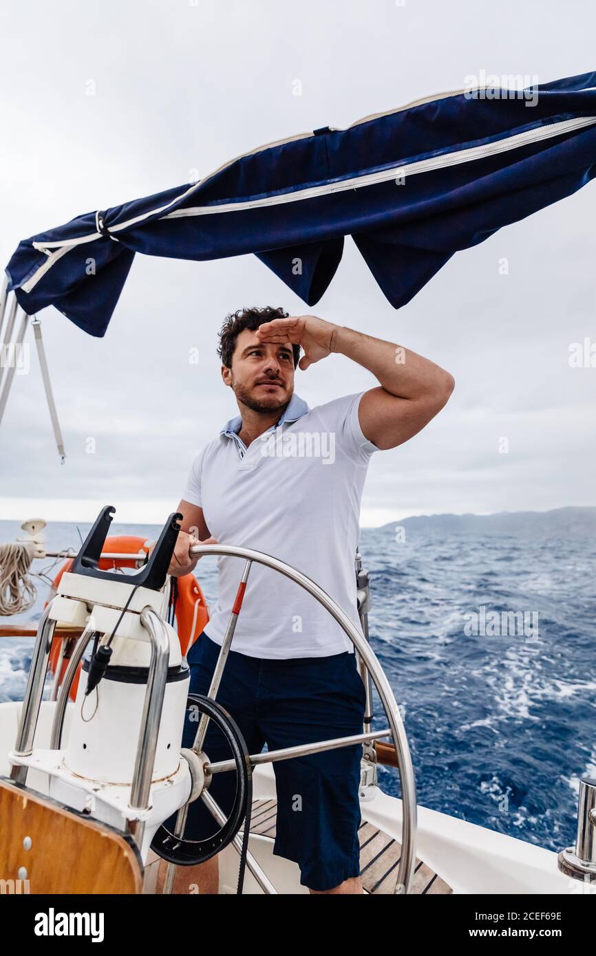 Captain of a ship sailing on a sailboat Stock Photo Alamy