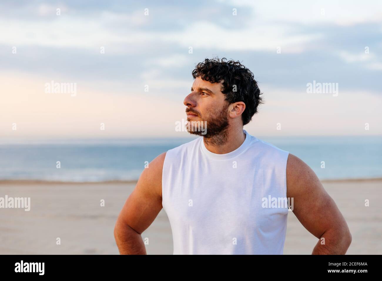 Handsome guy standing sunset hi-res stock photography and images - Alamy
