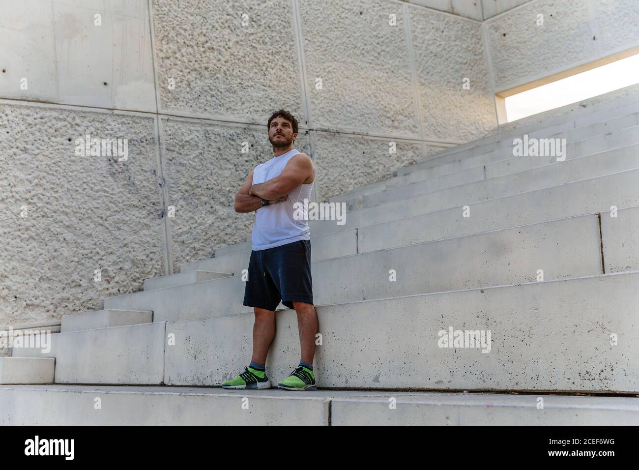 sportsman standings on steps Stock Photo