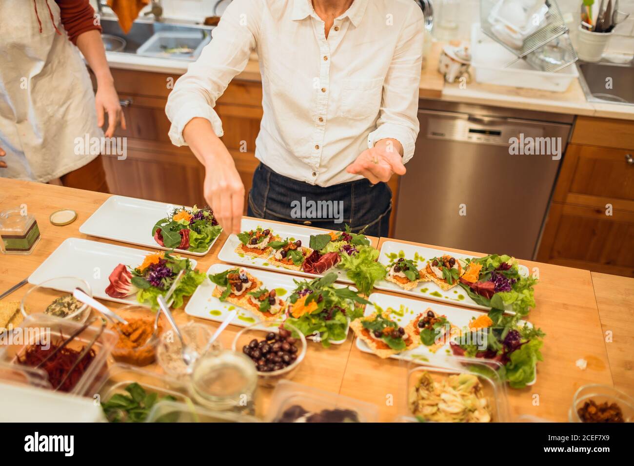 Two women cooking in cafe Stock Photo