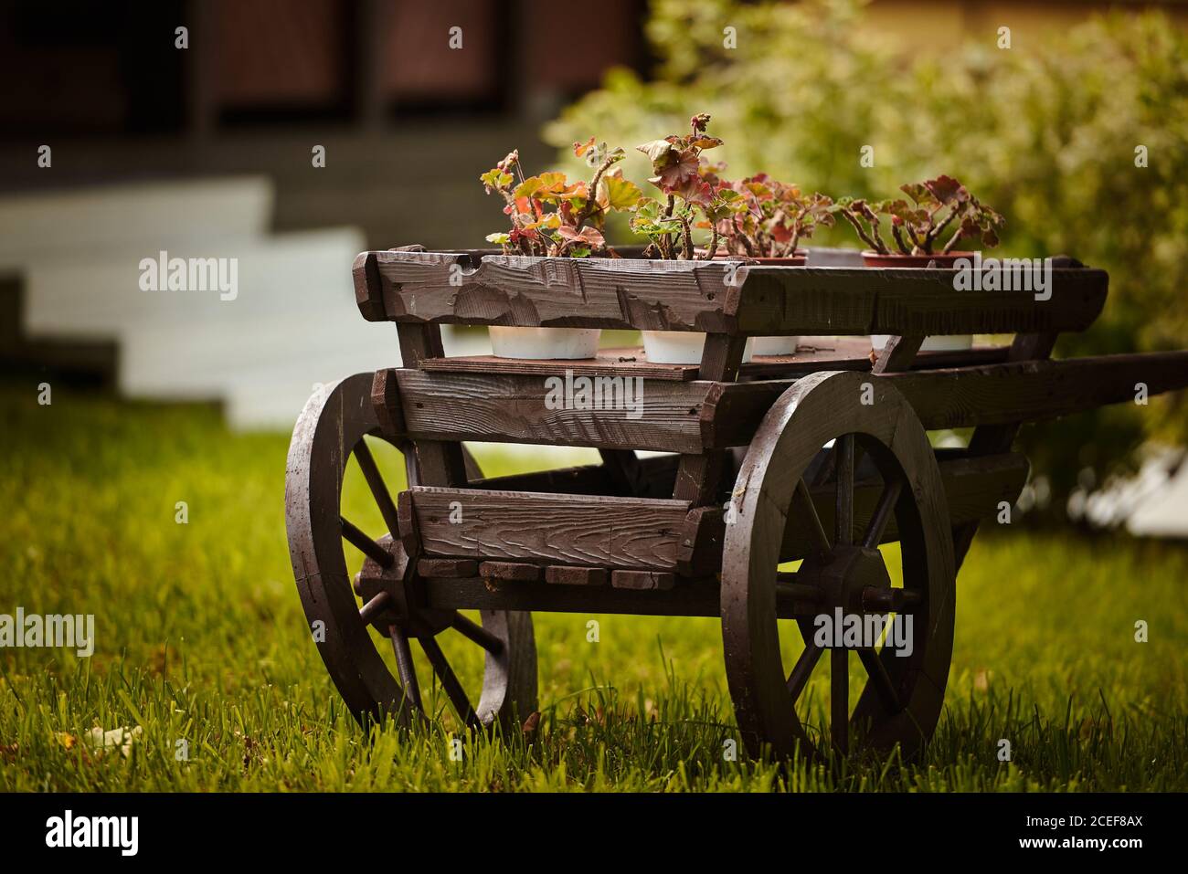 Old wooden wheelbarrow hi-res stock photography and images - Alamy