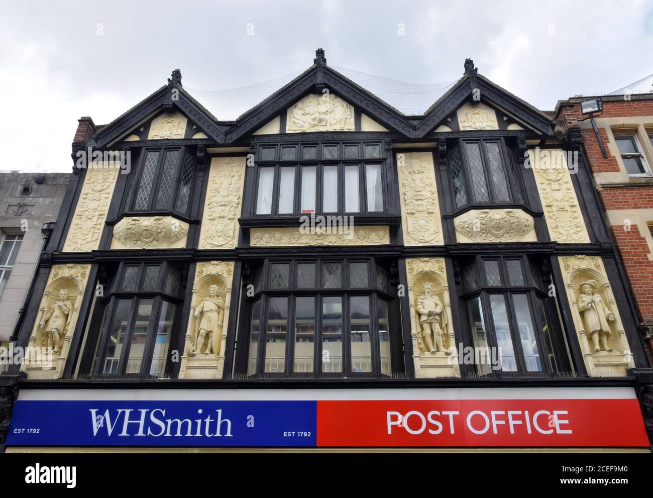 mock tudor facade of former boots chemist, feature king canute, bury st