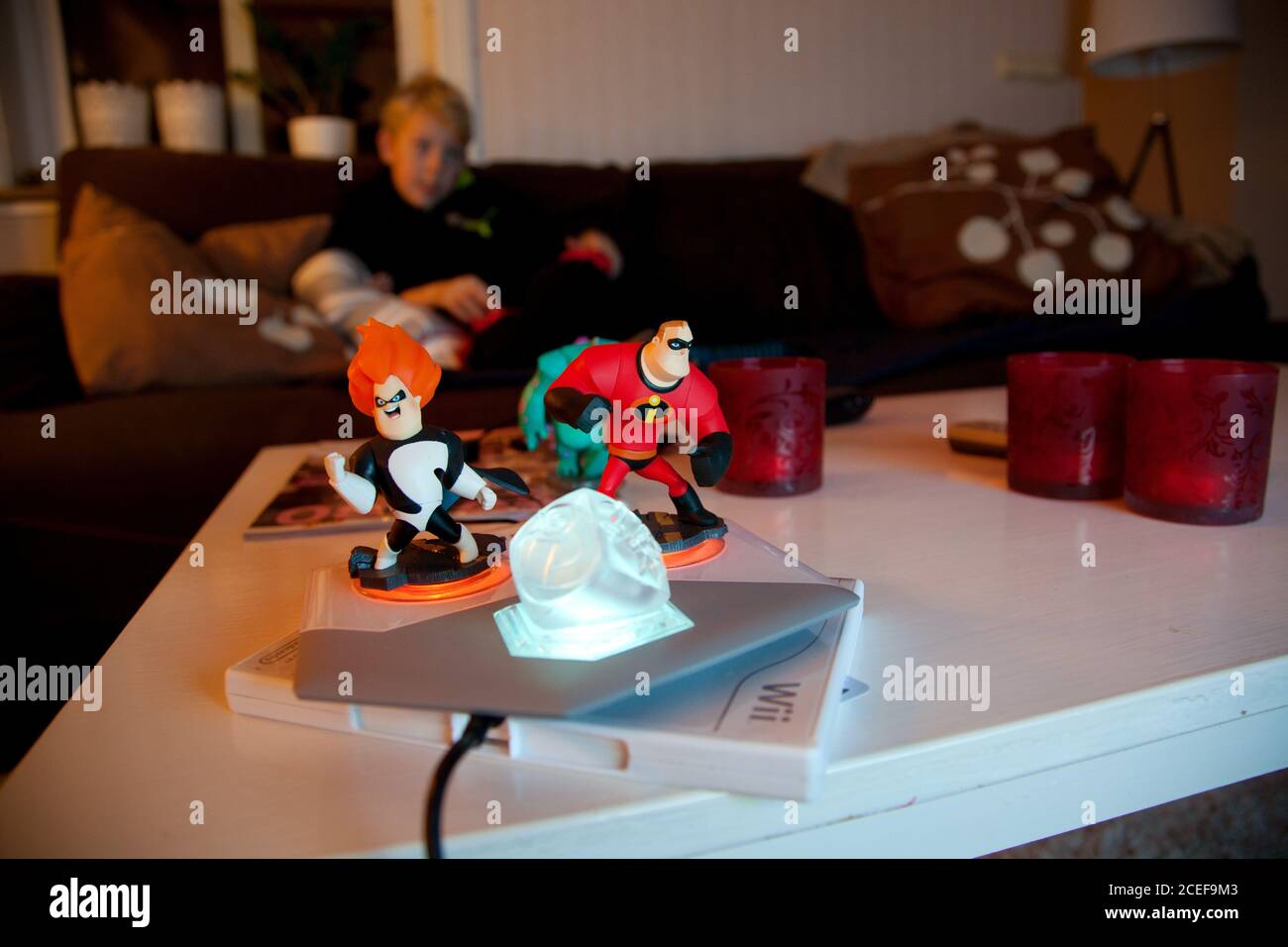A little guy who plays the video game Disney Infinity for the Nintendo Wii.  Photo Jeppe Gustafsson Stock Photo - Alamy