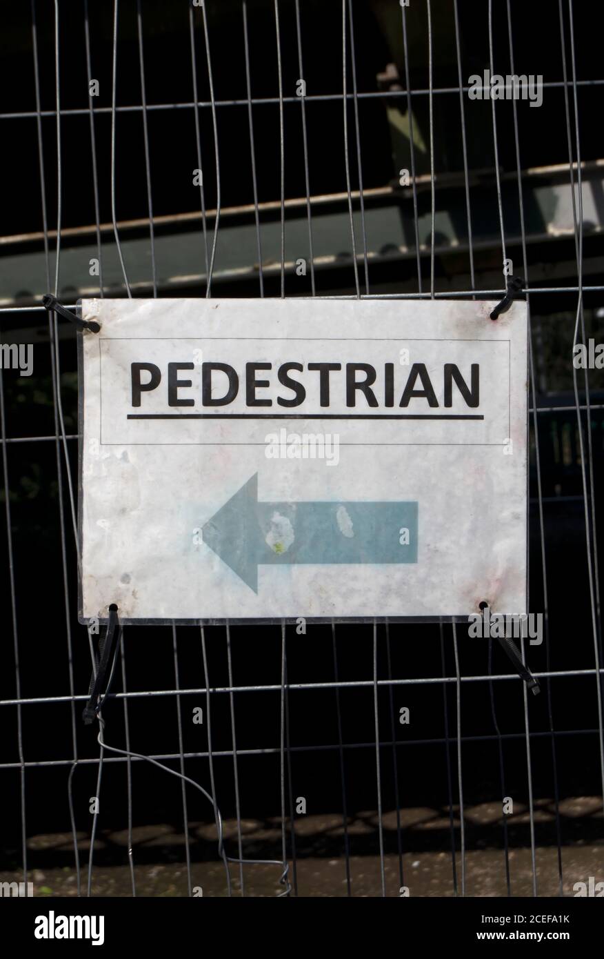 sign indicating route for pedestrians, though written in the singular form, during the closure of  hammersmith bridge Stock Photo
