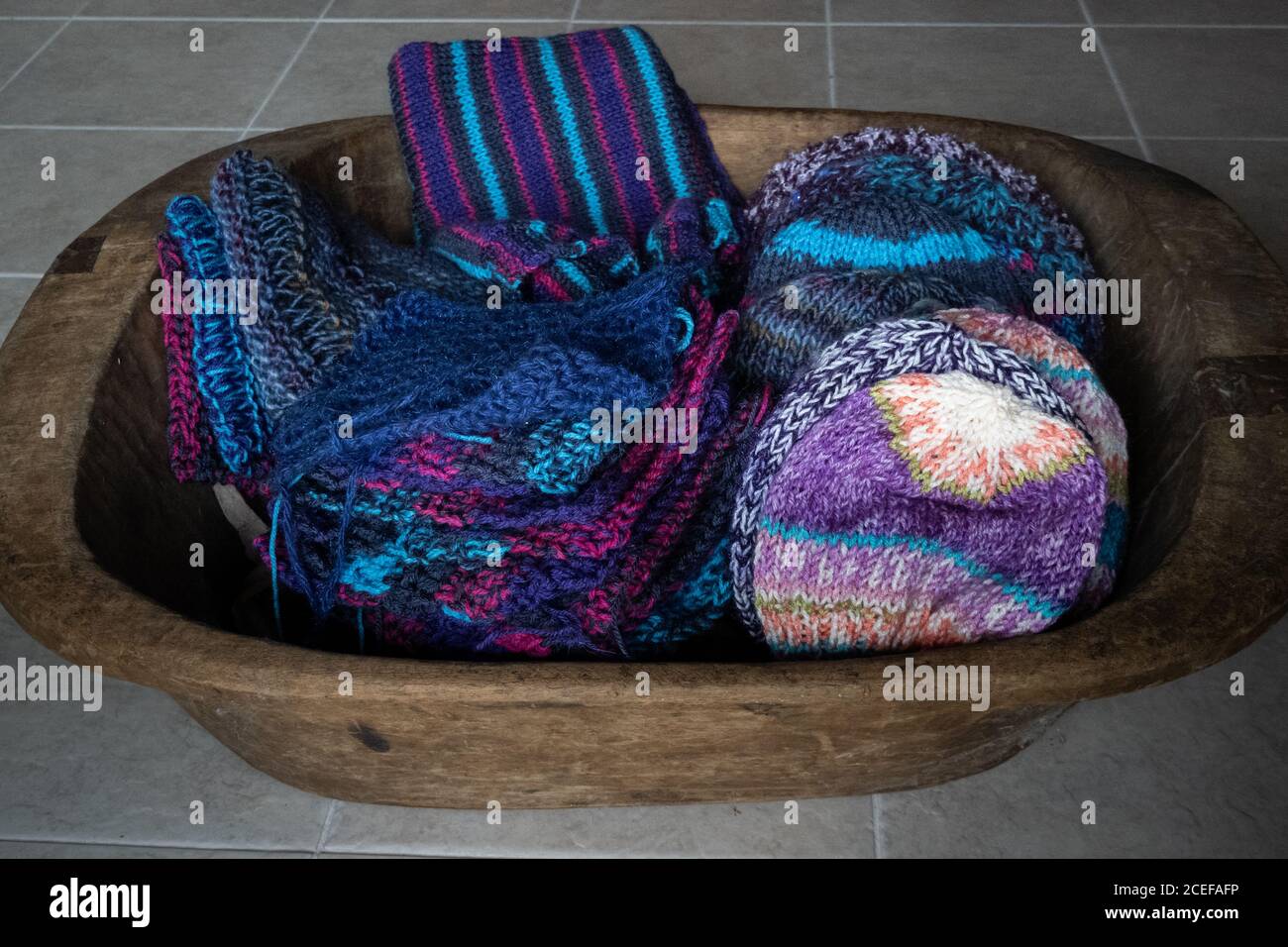 hand knit hats, scarves, and squares Stock Photo
