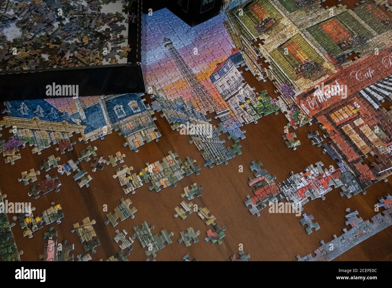 a jigsaw puzzle being assembled Stock Photo