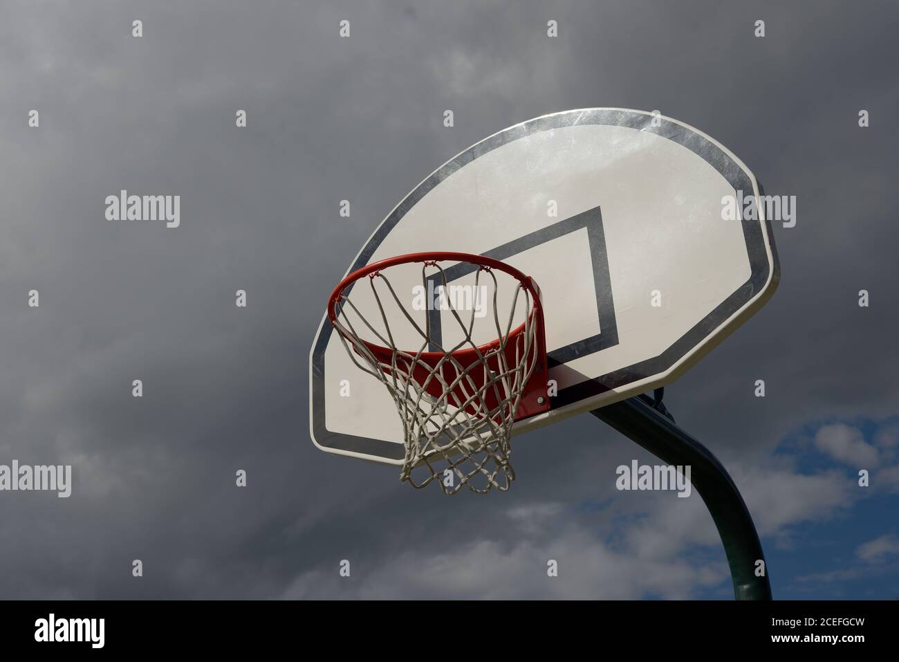 basketball hoop on cloudy sky background outdoor Stock Photo - Alamy