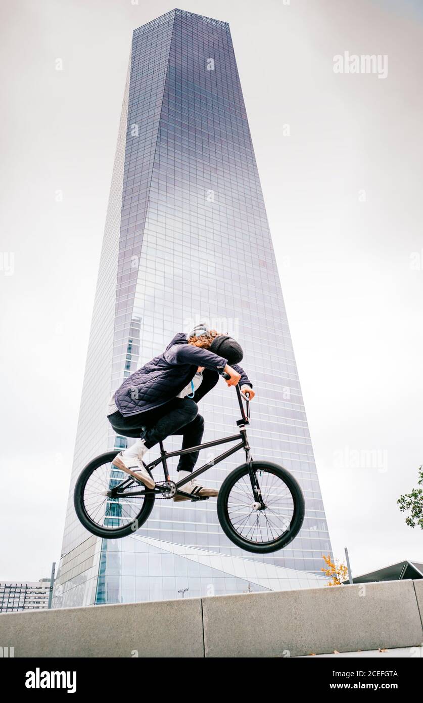 Young man practices with BMX bicycle. Stock Photo