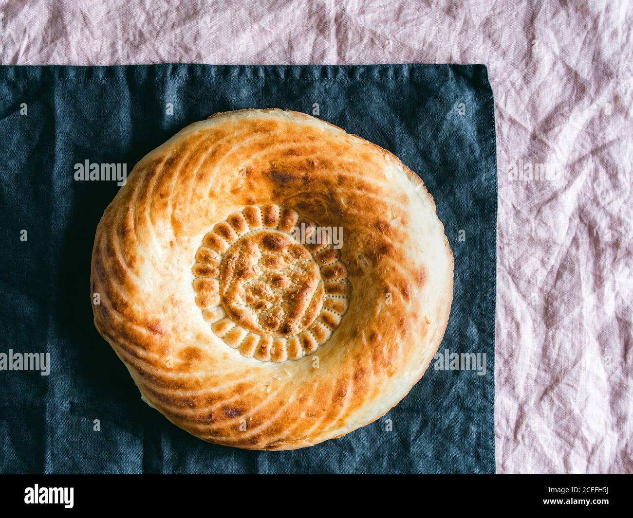 Bread on linen tablecloth Stock Photo