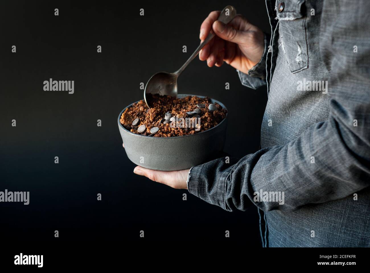 Man eating cereal snack hi-res stock photography and images - Alamy