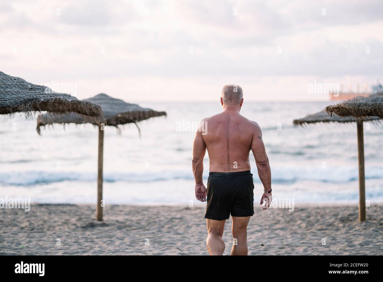 Old man walking away hi-res stock photography and images - Alamy