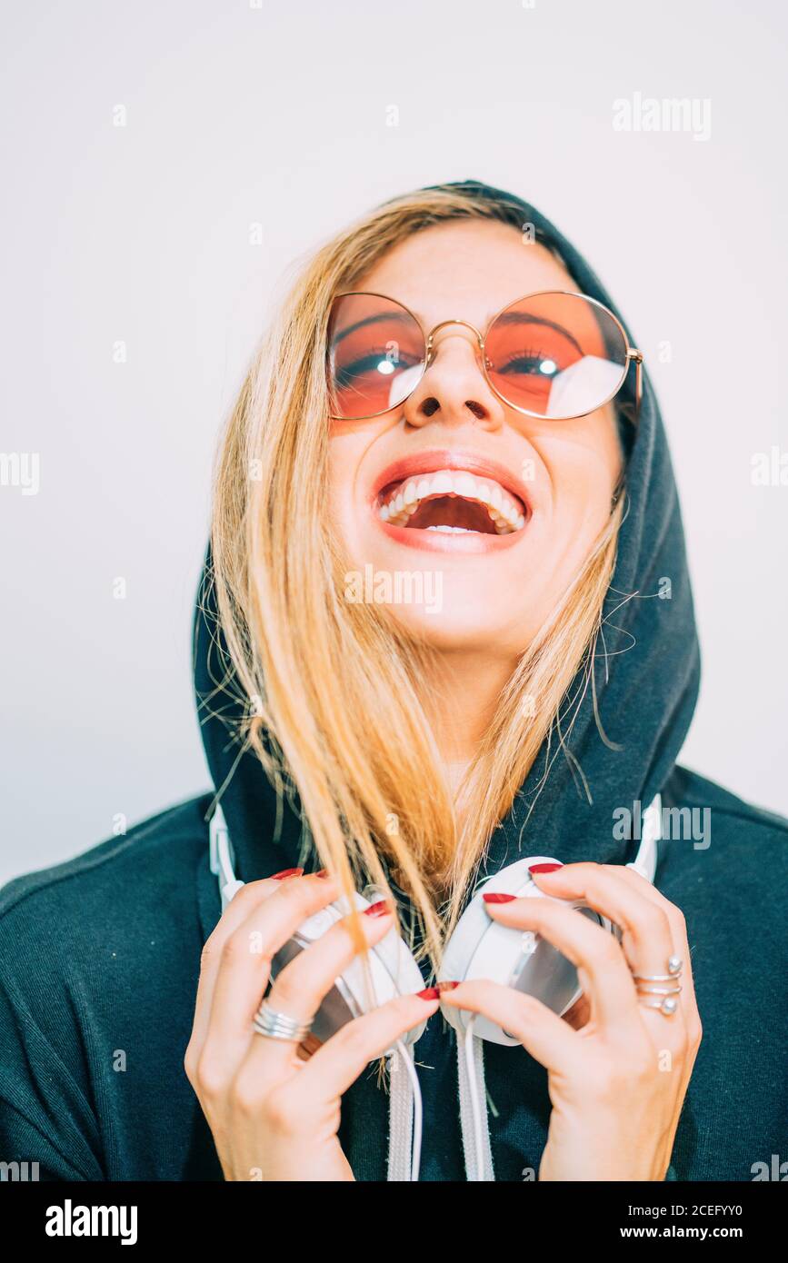 Young Woman in sunglasses looking at camera Stock Photo